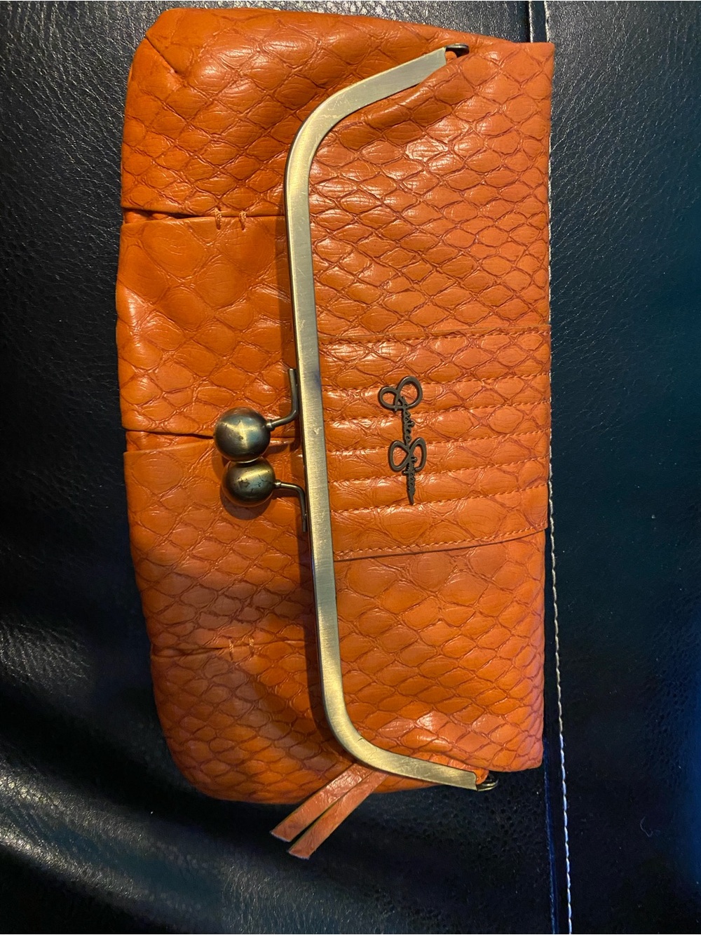 Jessica Simpson Orange Textured Kiss-Lock Clutch with Gold Hardware